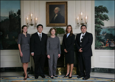 Mrs. Laura Bush poses Oct. 21, 2008 with the U.S. National Commission for UNESCO Laura W. Bush Traveling Fellows in the Diplomatic Reception Room of the White House. From left are Laura Olsen, David Lee, Heather McGee and Michael Aguilar.