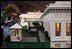 Mrs. Laura Bush peers through the windows of West Wing on a detailed recreation of the White House during a visit Tuesday, Sept. 2, 2008, to CivicFest: A Very Minnesota Celebration, at the Minneapolis Civic Center. Created by John and Jan Zweifel, the replica was created using photographs, published drawings and memories from frequent public tours and is part of a vibrant civic festival celebrating Minnesota and American history, democracy and the U.S. Presidency.