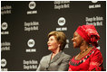 Mrs. Laura Bush sits with HIV and AIDS advocate Princess Kasune Zulu at the ONE campaign event Tuesday, Sept. 2, 2008 at the Minneapolis Convention Center in Minneapolis, during a program in support of health care workers who treat AIDS patients in African countries.