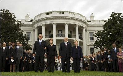 President George W. Bush and Mrs. Laura Bush and Vice President Dick Cheney and Mrs. Lynne Cheney stand at attention during the observance Thursday, Sept. 11, 2008, on the South Lawn of the White House of the seventh anniversary of the September 11 terrorist attacks.