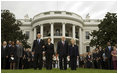 President George W. Bush and Mrs. Laura Bush and Vice President Dick Cheney and Mrs. Lynne Cheney stand at attention during the observance Thursday, Sept. 11, 2008, on the South Lawn of the White House of the seventh anniversary of the September 11 terrorist attacks.