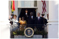 President George W. Bush and Mrs. Laura Bush, joined by President John Agyekum Kufuor and Mrs. Theresa Kufuor of Ghana, acknowledge the crowd Monday, Sept. 15, 2008, following the South Lawn Arrival Ceremony for President Kufuor and Mrs. Kufuor of Ghana at the White House.