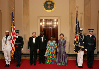 President George W. Bush and Mrs. Laura Bush pose with President John Agyekum Kufuor of Ghana and Mrs. Theresa Kufuor after their arrival at the White House Monday, Sept. 15, 2008, for a State Dinner.