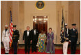 President George W. Bush and Mrs. Laura Bush pose with President John Agyekum Kufuor of Ghana and Mrs. Theresa Kufuor after their arrival at the White House Monday, Sept. 15, 2008, for a State Dinner.