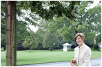 Mrs. Laura Bush plants a Silver Leaf Linden tree during a commemorative tree planting ceremony Saturday, Sept. 27, 2008, on the South Lawn of the White House. The tradition of planting a commemorative tree dates back to 1830 when President Andrew Jackson two Southern Magnolias on either side of the South Portico of the White House.