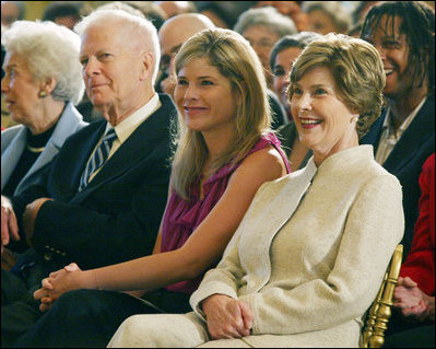 Mrs. Laura Bush and daughter Jenna Hager listen to author Jan Brett during the National Book Festival Breakfast Saturday, Sept. 27, 2008, in the East Room of the White House.