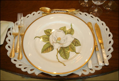 The Magnolia Residence China was unveiled Wednesday, Jan. 7, 2009, by Mrs. Laura Bush at the White House with plates whose magnolia decoration give the china it's name. Other pieces show a varied and detailed pattern from nature. There are 75 place settings of the service which were purchased by the White House Historical Association through the George W. Bush Redecoration Fund. This new china, by Pickard China of Antioch, Ill., was designed in Virginia and hand painted in Hungary.
