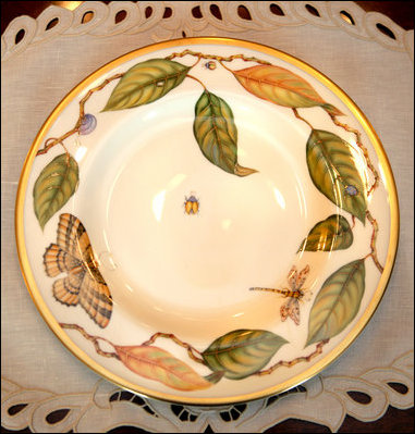 Pieces of the Magnolia Residence China, which was unveiled Wednesday, Jan. 7, 2009, by Mrs. Laura Bush at the White House, show variations of the detailed theme from nature. Plates show an elegant magnolia for which the pattern is named. There are 75 place settings of the service which were purchased by the White House Historical Association through the George W. Bush Redecoration Fund. There are 75 place settings of the new china. The service includes the service plate, the dinner plate, a salad plate and desert plate, a soup cup, tea cup and tea saucer.