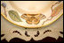 The rim of the Magnolia Residence China, which was unveiled Wednesday, Jan. 7, 2009, by Mrs. Laura Bush at the White House, has a varied and detailed pattern from nature. There are 75 place settings of the service which were purchased by the White House Historical Association through the George W. Bush Redecoration Fund. This new china, which was designed in Virginia and hand painted in Hungary, will be used in the private Residence.