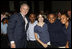 President George W. Bush poses with a group of students Thursday, Jan. 8, 2009, following his address at the General Philip Kearny School in Philadelphia, where President Bush spoke about the success of the No Child Left Behind Act and urged Congress to strenghten and reauthorize the legislation.