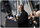 President George W. Bush addresses his remarks in honor of his father, former President George H. W. Bush, at the commissioning ceremony of the USS George H.W. Bush (CVN 77) aircraft carrier Saturday, Jan 10, 2009 in Norfolk, Va.