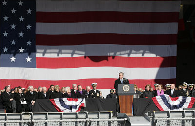 President George W. Bush addresses his remarks in honor of his father, former President George H. W. Bush, at the commissioning ceremony of the USS George H. W. Bush (CVN 77) aircraft carrier Saturday, Jan 10, 2009 in Norfolk, Va.