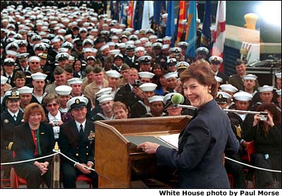 Mrs. Bush speaks with members of the military about Troops to Teachers, a program that encourages retired military personnel to become teachers. (San Diego, California, March 23, 2001) White House photo by Paul Morse.