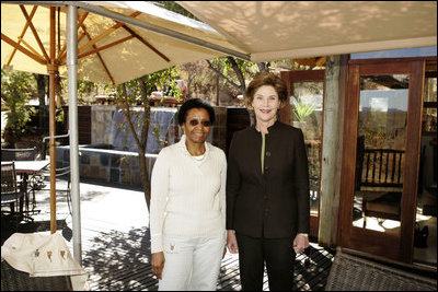 Laura Bush meets with Mrs. Zanele Mbeki, wife of South African President Thabo Mbeki Monday, July 11, 2005, at the Etali Lodge in the Madikwe Game Reserve in South Africa.