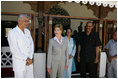 Laura Bush visits with President Amani Abeid Karume, pictured at left, in Zanzibar, Tanzania, Thursday, July 14, 2005. 