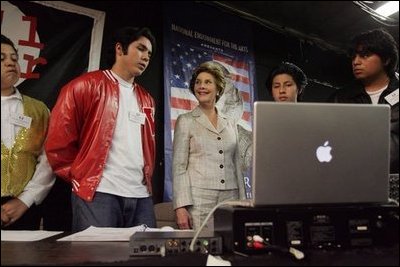 Laura Bush talks with members of the Shakespeare Festival/LA's Will Power to Youth program before watching their rendition of "Romeo and Juliet" in Los Angeles April 26, 2005.