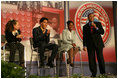 Claude Allen, Assistant to the President for Domestic Policy, right, leads a session of the program, Thursday, Oct. 27, 2005 at Howard University in Washington, during the White House Conference on Helping America's Youth. 