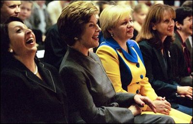 Laura Bush laughs with first ladies Bella Kocharian of Armenia, left, Lyudmila Putin of Russia, center, and Zorka Purvanova of Bulgaria, right, during a program about writers of children's book at the Book Festival hosted by Mrs. Putin Oct. 1, 2003, in Moscow.