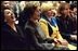 Laura Bush laughs with first ladies Bella Kocharian of Armenia, left, Lyudmila Putin of Russia, center, and Zorka Purvanova of Bulgaria, right, during a program about writers of children's book at the Book Festival hosted by Mrs. Putin Oct. 1, 2003, in Moscow.