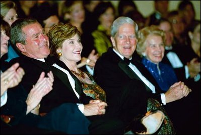 President George W. Bush and Laura Bush attend the 2003 National Book Festival Gala Performance and Dinner at the Library of Congress in Washington, D.C., Oct. 3, 2003.
