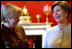 Laura Bush shares a light moment with Ludmila Putina, wife of Russian Federation President Vladimir Putin, in the Red Room of the White House the Saturday, October 12, 2002 prior to the opening ceremony of the Second Annual National Book Festival. 
