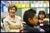 Mrs. Bush visits students in the Reading Lab classroom at Limerick Elementary School in Canoga Park, Calif., Feb. 18, 2004.