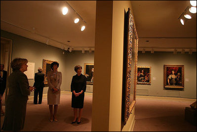 Mrs. Laura Bush and Mrs. Giovanni Castellaneta, wife of the Italian Ambassador to the United States, tour an exhibit of Italian Women Artists from Renaissance to Baroque at the National Museum of Women in the Arts Thursday, March 22, 2007, in Washington, D.C. They are guided by the museum's director Dr. Judy L. Larson, who is pictured at the far left.