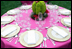 A table is set for the dinner in honor of Cinco de Mayo hosted by President George W. Bush and Mrs. Laura Bush in the Rose Garden Monday, May 5, 2008, at the White House.