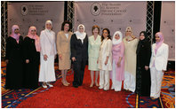 Mrs. Laura Bush joins Nancy Brinker, founder of the Susan G. Komen Breast Cancer Foundation, fourth from left, and women from Saudi Arabia and the United Arab Emirates, Monday, June 12, 2006, at the Susan G. Komen Breast Cancer Foundation’s 2006 Mission Conference in Washington, D.C. Mrs. Bush announced the U.S.-Middle East Partnership for Breast Cancer Awareness and Research which allows governments, hospitals, researchers, and survivors to work with each other to help defeat breast cancer. White House photo by Shealah Craighead .