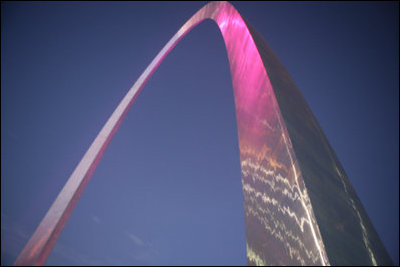 The Gateway Arch in St. Louis was illuminated in pink in honor of Breast Cancer Awareness Month during the Arch Lighting for Breast Cancer Awareness Thursday, Oct. 12, 2006. Mrs. Laura Bush delivered remarks and met with the audience members during the event. White House photo by Shealah Craighead 