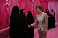 Mrs. Laura Bush meets one-on-one with women in the Pink Majlis Monday, Oct. 22, 2007, at the Sheikh Khalifa Medical Center in Abu Dhabi, United Arab Emirates. The Majlis is a tradition of open forum for a wide range of topics. The Majlis focuses issues related to breast cancer. 
