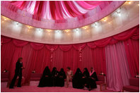 Mrs. Laura Bush talks with women in the Pink Majlis Monday, Oct. 22, 2007, at the Sheikh Khalifa Medical Center in Abu Dhabi, United Arab Emirates. The Majlis is a tradition of open forum for a wide range of topics. The Majlis focuses issues related to breast cancer. 