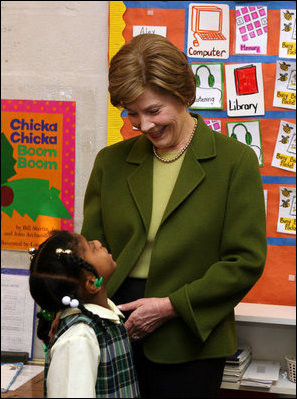 Mrs. Laura Bush listens to a kindergarten student during her visit at Holy Redeemer School Wednesday, Jan. 30, 2008. 