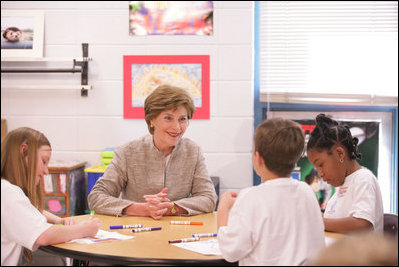 Mrs. Laura Bush participates in a discussion with children in a Boys & Girls Club program Thursday, Feb. 22, 2007 at the D’Iberville Elementary School in D’Iberville, Miss.