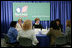 Mrs. Laura Bush is joined by U.S. Department of Education Secretary Margaret Spellings at a roundtable discussion with Ohio teachers during "Celebrating Teachers" week, Tuesday, May 2, 2006 at the Thurber Center in Columbus, Ohio, highlighting the importance of teachers in children's lives. Moderator of the discussion is Deepa Ganschinietz, far right, the 2006 Ohio Teacher of the Year.