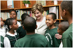 Mrs. Laura Bush meets with students during her visit to Our Lady of Perpetual Help School in Washington, Monday, June 5, 2006, where she announced a Laura Bush Foundation for America’s Libraries grant to the school. White House photo by Shealah Craighead 