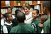 Mrs. Laura Bush meets with students during her visit to Our Lady of Perpetual Help School in Washington, Monday, June 5, 2006, where she announced a Laura Bush Foundation for America's Libraries grant to the school.