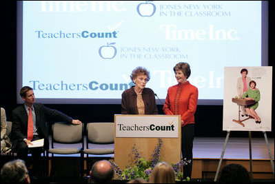 Mrs. Laura Bush stands with her second grade teacher, Charlene Gnagy, as Mrs. Gnagy speaks to the audience Thursday, October 5, 2006, during the TeachersCount “Behind every famous person is a fabulous teacher” PSA campaign launch ceremony in New York City. The campaign is to help create awareness for teachers and the role they play in the lives of children and to raise the status of the teaching profession.