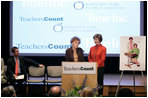 Mrs. Laura Bush stands with her second grade teacher, Charlene Gnagy, as Mrs. Gnagy speaks to the audience Thursday, October 5, 2006, during the TeachersCount “Behind every famous person is a fabulous teacher” PSA campaign launch ceremony in New York City. The campaign is to help create awareness for teachers and the role they play in the lives of children and to raise the status of the teaching profession. White House photo by Shealah Craighead 