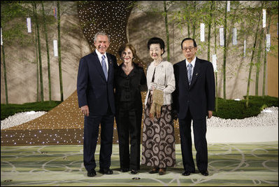 President George W. Bush and Mrs. Laura Bush stand with Japan's Prime Minister Yasuo Fukuda and Mrs. Kiyoko Fukuda in the banquet lobby of the Windsor Hotel Toya Resort and Spa Monday, July 7, 2008, in Toyako, Japan, prior to the dinner with G8 leaders and spouses.