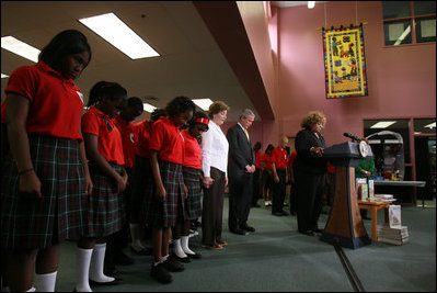 President George W. Bush and Mrs. Laura Bush join students and facility at the Dr. Martin Luther King Jr. Charter School for Science and Technology in a moment of silence marking the second anniversary of Hurricane Katrina, Wednesday, Aug. 29, 2007, in New Orleans.