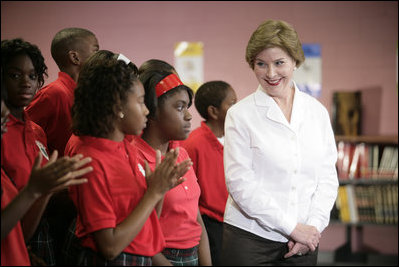 Mrs. Laura Bush thanks students for their applause as she is introduced during her visit with President George W. Bush to the Dr. Martin Luther King Jr. Charter School for Science and Technology,Wednesday, Aug. 29, 2007, in New Orleans.