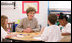 Mrs. Laura Bush participates in a discussion with children in a Boys & Girls Club program Thursday, Feb. 22, 2007 at the D’Iberville Elementary School in D’Iberville, Miss. White House photo by Shealah Craighead 