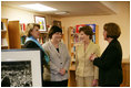 Mrs. Laura Bush and U.S. Secretary of Education Margaret Spellings meet with school officials to talk about the The Laura Bush Foundation for America's Libraries' Gulf Coast Library Recovery Initiative grant announcement at the St. Bernard Unified School Wednesday, May 3, 2006 in Chalmette, La. White House photo by Kimberlee Hewitt 