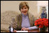  Taking the opportunity to speak about American Heart Month, Mrs. Laura Bush delivers the weekly radio address from her office in the White House. Said Mrs. Bush, "This American Heart Month, all of us can be Heart Truth ambassadors. Start by protecting your own heart, and spread the word to others. February is a month known for Valentines. This February, encourage your loved ones to take care of their health. It's the best Valentine's gift you could possibly give."