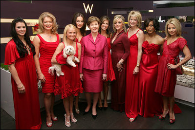 Mrs. Laura Bush joins celebrity models participating in the Red Dress Collection Celebrity Fashion Show Friday, Feb. 2, 2007, during Fashion Week in New York to raise awareness of heart disease and the importance of heart health for women. Standing with Mrs. Bush are, from left: Danica Patrick, Mary Hart, Kristin Chenoweth, Camilla Belle, Natalie Morales, Jane Krakowski, Paula Zahn, Angela Bassett and Kelly Ripa. White House photo by Shealah Craighead 