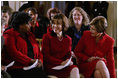 Laura Bush sits with Department of Health and Human Services Acting Assistant Secretary for Health Dr. Cristina Beato, center, and heart attack survivor Joyce Cullen, left, during White House ceremonies to launch American Heart Monday, Monday, Feb. 2, 2004. 