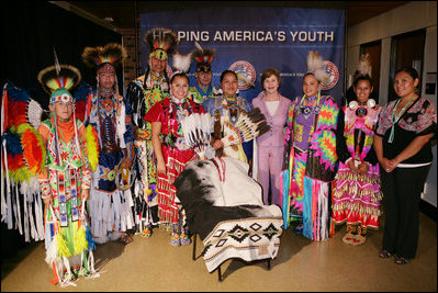 Mrs. Laura Bush meets members of the Three Affiliated Tribes Youth Dance Troupe following their performance at the Helping America's Youth Fourth Regional Conference in St. Paul, Minn., Friday, August 3, 2007. The dancers, ranging in age from 10 to eighteen, showcased six styles of Plains Powwow Dancing. Each style of dance represents a specific history and tells a story of American Indian culture.