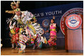 Members of the Three Affiliated Tribes Youth Dance Troupe perform at the Helping America's Youth Fourth Regional Conference in St. Paul, Minn., Friday, August 3, 2007. The dancers, ranging in age from 10 to eighteen, showcased six styles of Plains Powwow Dancing. Each style of dance represents a specific history and tells a story of American Indian culture. A segment of the conference addressed the unique challenges facing tribal youth.