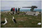 Mrs. Laura Bush views albatross birds and remnants of World War II with wildlife biologist John Klavitter during a tour of Eastern Island on Midway Atoll, part of the Northwest Hawaiian Islands National Monument, Thursday, March 1, 2007. Midway Atoll was the site of the Battle of Midway June 4, 1942. The U.S. Navy defeated a Japanese attack against Midway Islands, marking a turning point in the war in the pacific theater.